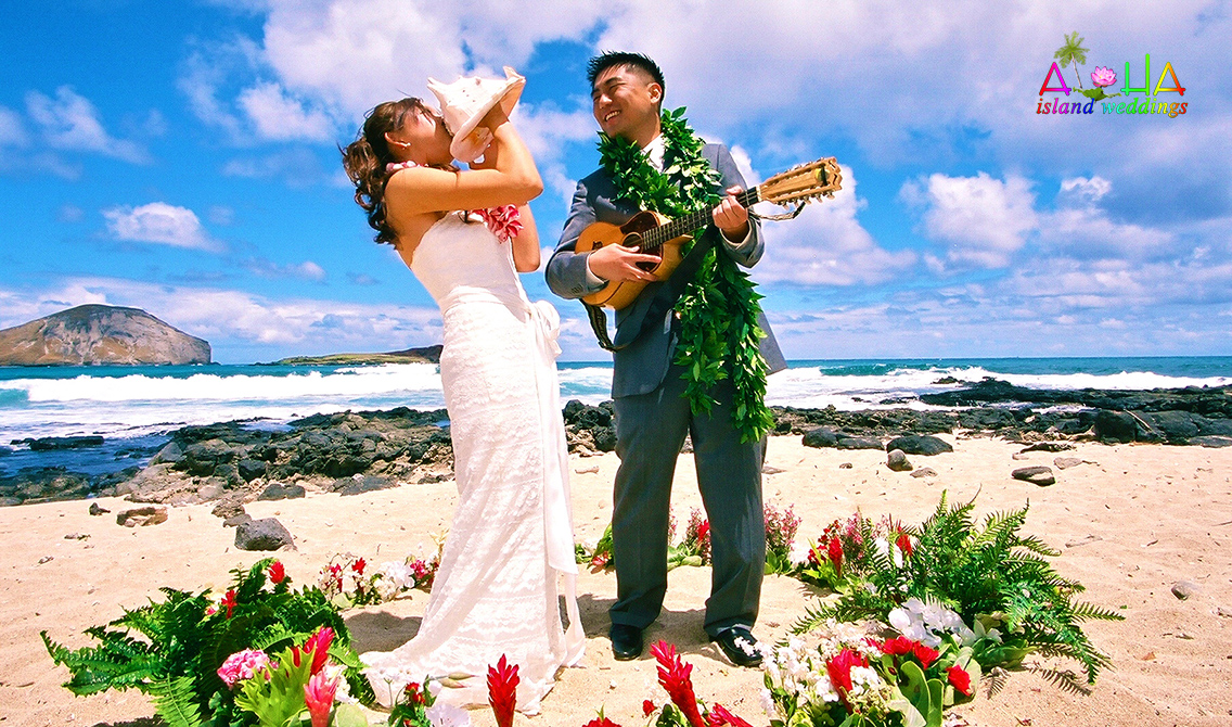 flower circle groom playing the ukulele and bride blowing the conch shell
